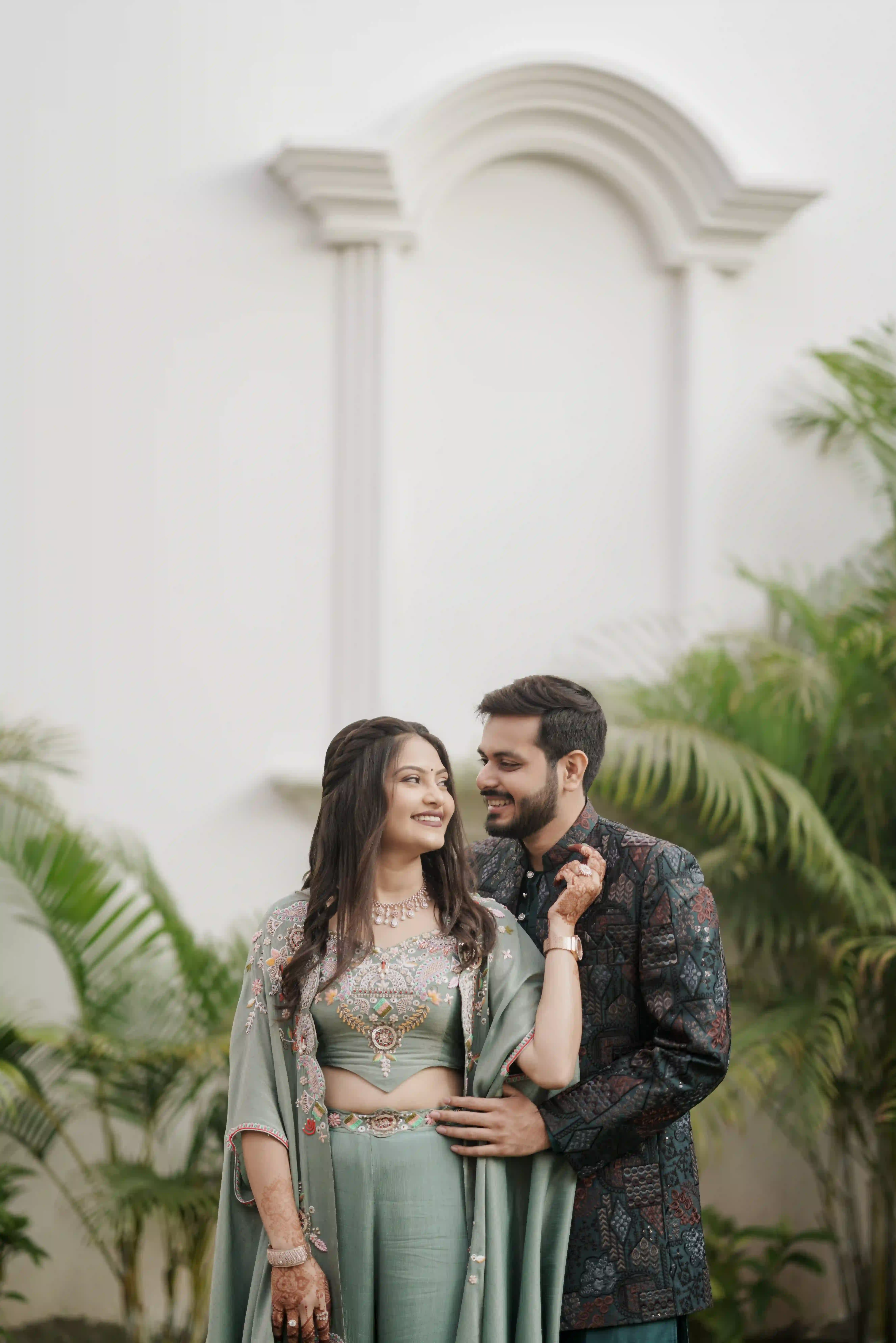 Couple sharing an intimate moment during a pre-wedding photoshoot